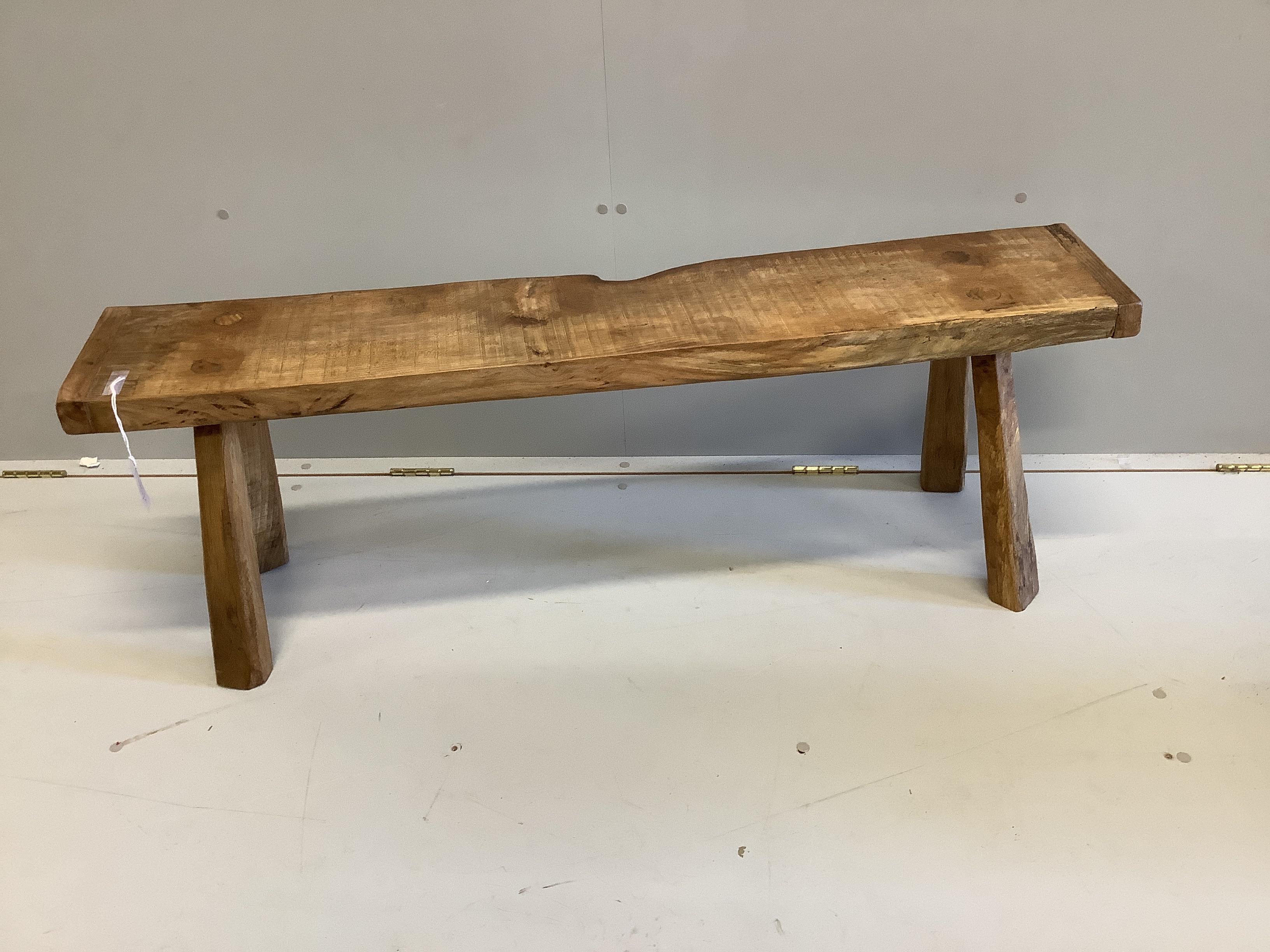 Two 18th century style fruitwood and pine bench seats, larger length 129cm, height 45cm